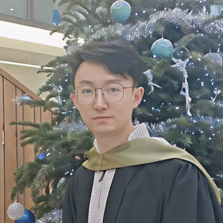 Dr. Chen Feng in academic gown